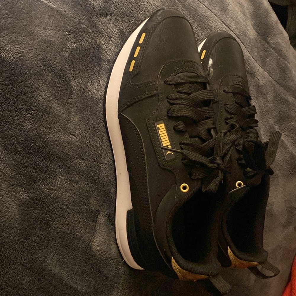 Black and Gold Puma Sneakers. Like new. Super comfy and cute